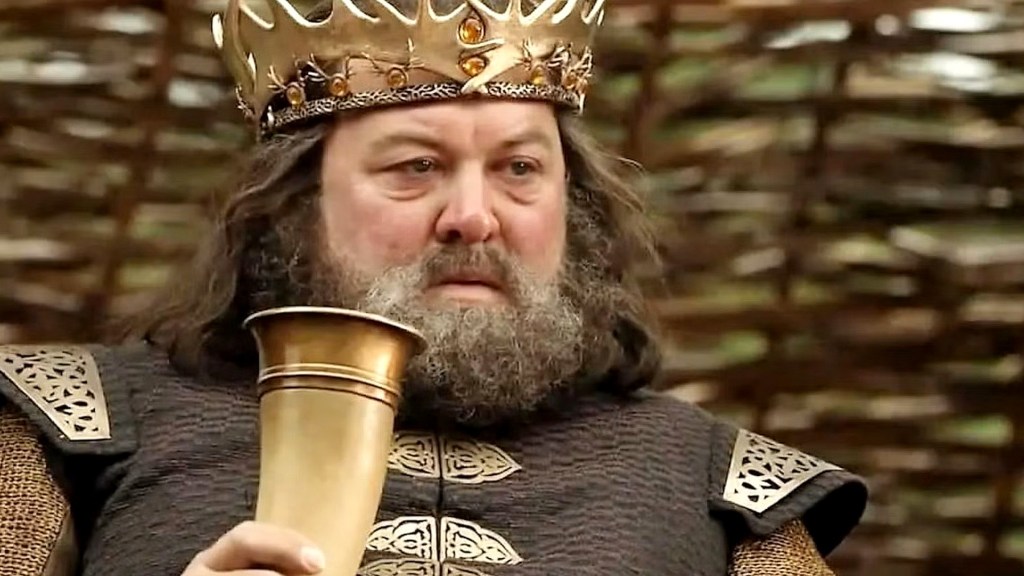 Robert Baratheon tampak kesal dengan tanduk minum di tangannya dalam Game of Thrones Season 1