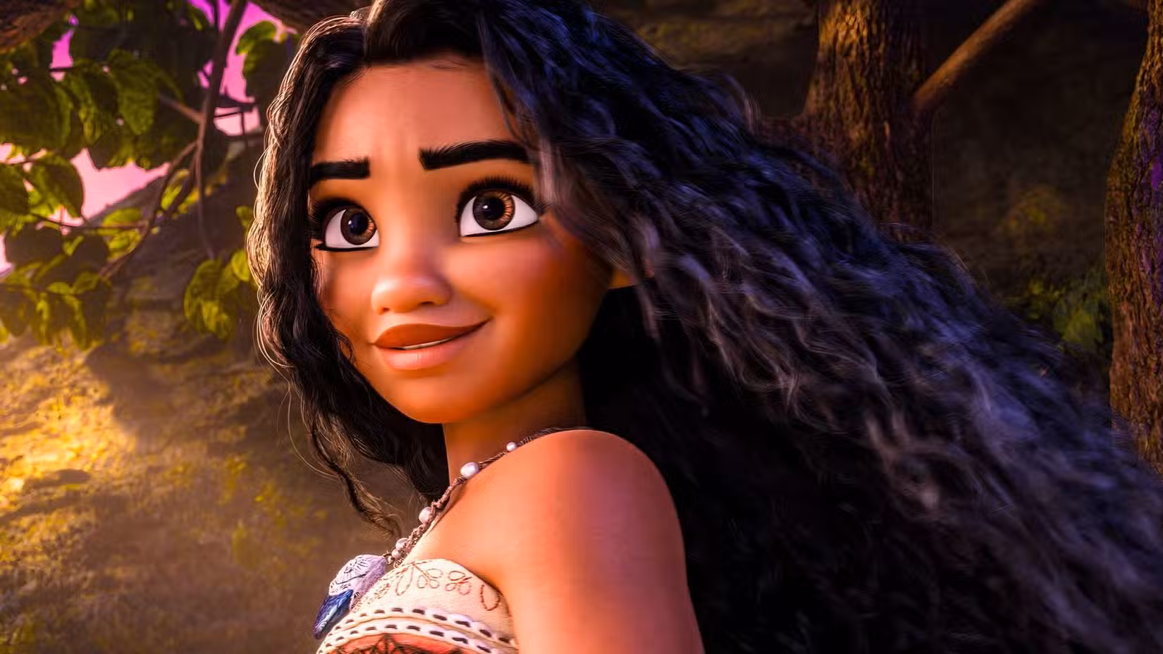 Moana looking to the horizon with a tree behind her in Moana 2