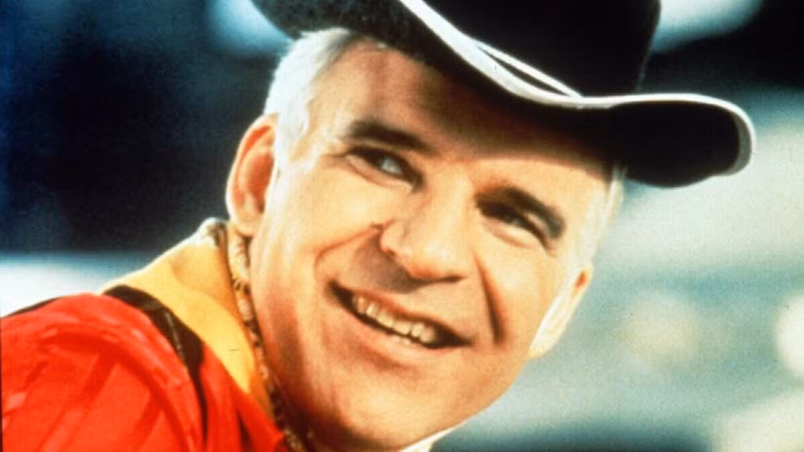 Steve Martin smiles while dressed as a cowboy in Parenthood