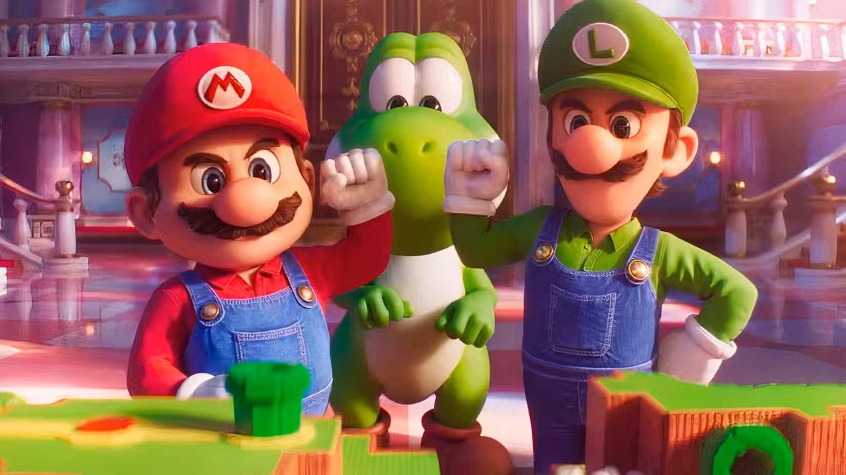 Mario and Luigi move their knuckles while Yoshi is in the center in Super Mario Galaxy Movie