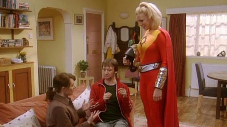Lula/Thermowoman standing, while George and Janet speak